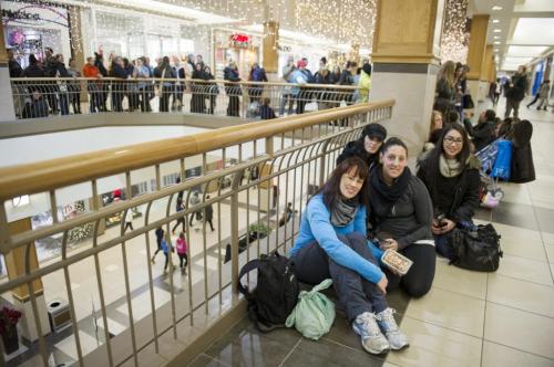 122612 Winnipeg -  Tiffaney Taverner (left) was first in line, with friend Kerris Chinery, were in front of hundreds of people (mostly women) who waited in line for the 8AM opening of the Polo Park Lululemon  store on Boxing Day.  DAVID LIPNOWSKI / WINNIPEG FREE PRESS