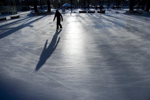 122612 Winnipeg - A lone ice skater at The Forks Wednesday on Boxing Day.  DAVID LIPNOWSKI / WINNIPEG FREE PRESS