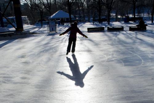 122612 Winnipeg - A lone ice skater at The Forks Wednesday on Boxing Day.  DAVID LIPNOWSKI / WINNIPEG FREE PRESS