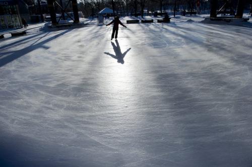 122612 Winnipeg - A lone ice skater at The Forks Wednesday on Boxing Day.  DAVID LIPNOWSKI / WINNIPEG FREE PRESS