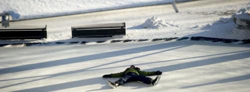 122612 Winnipeg - A boy falls while ice skating at The Forks Wednesday on Boxing Day.  DAVID LIPNOWSKI / WINNIPEG FREE PRESS