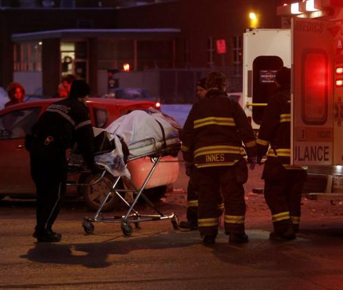Winnipeg Fire Paramedics care for a person injured in a Thursday morning motor vehicle collision on Logan Ave. at Stanley St. (WAYNE GLOWACKI/WINNIPEG FREE PRESS) Winnipeg Free Press  Dec.27   2012