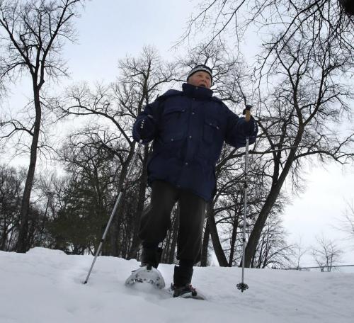 Victor Zahn enjoys the -13C afternoon in the Kildonan Park trekking on his snowshoes.   . (WAYNE GLOWACKI/WINNIPEG FREE PRESS) Winnipeg Free Press  Dec.27   2012