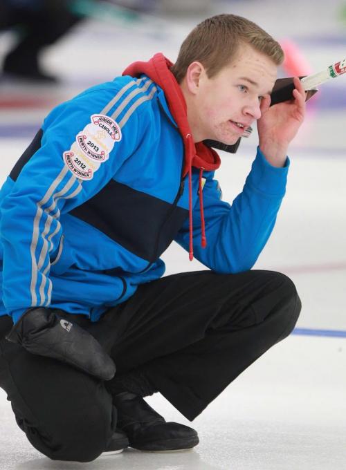 Cole Peters from West St Paul Curling Club reacts to a missed shot he made while competing against Matt Dunstone in the  Tim Hortons Christmas Youth Bonspiel at Deer Lodge Curling Club Friday night- See Ed Tait story- December 27, 2012   (JOE BRYKSA / WINNIPEG FREE PRESS)