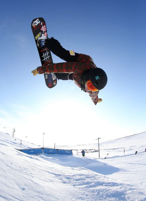 Eason Cerasani backflips over a tabletop jump while snowboarding at Spring Hill, Saturday, December 29, 2012. (TREVOR HAGAN/ WINNIPEG FREE PRESS)