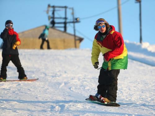 Joseph Kelly, 18, a snowboarder, riding at Springhill, Saturday, December 29, 2012. (TREVOR HAGAN/WINNIPEG FREE PRESS)
