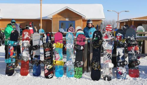 Snowboards lined up at Springhill, Saturday, December 29, 2012. (TREVOR HAGAN/WINNIPEG FREE PRESS)