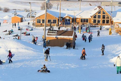 Skiers and snowboarders dot the hill at Springhill, Saturday, December 29, 2012. (TREVOR HAGAN/WINNIPEG FREE PRESS)