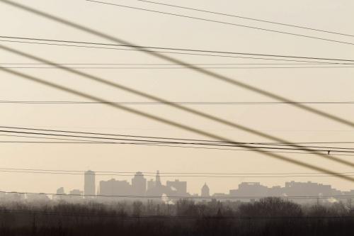 The Winnipeg skyline seen through chairlift cables at Springhill, located in the floodway, Saturday, December 29, 2012. (TREVOR HAGAN/WINNIPEG FREE PRESS)