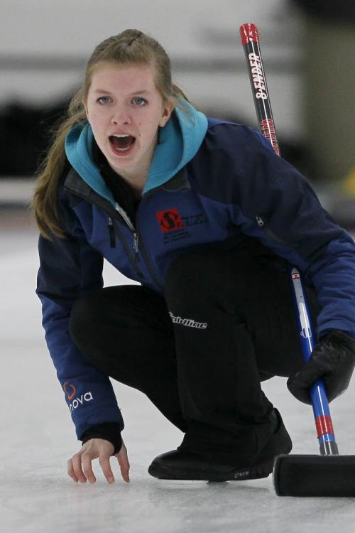 December 29, 2012 - 121229 - Christine Mackay curls against Jennifer Curle in the junior men's women's curling final at Assinboine Curling Club Saturday December 29, 2012. John Woods / Winnipeg Free Press