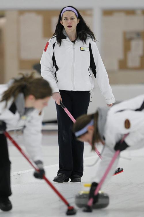 December 29, 2012 - 121229 - Jennifer Curle curls against Christine Mackay in the junior men's women's curling final at Assinboine Curling Club Saturday December 29, 2012. John Woods / Winnipeg Free Press