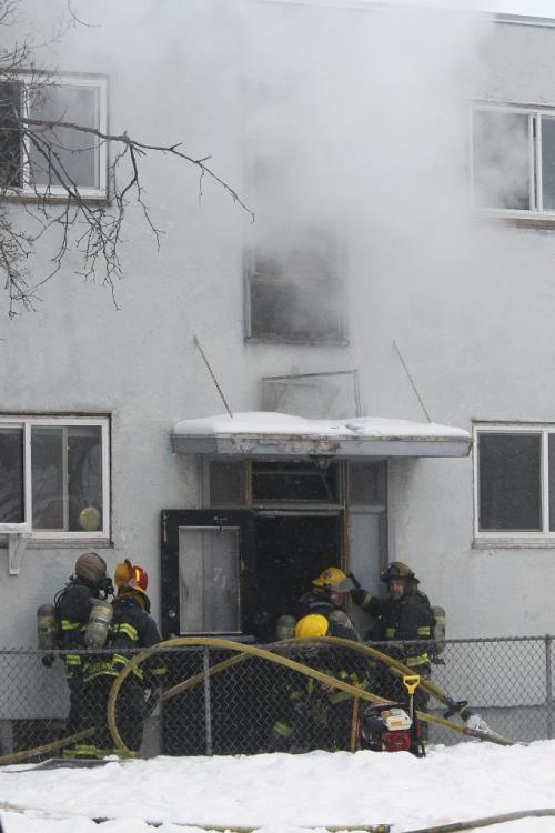 December 30, 2012 - 121230 - Firefighters attend a fire at 719 Sherbrook Sunday December 30, 2012.  John Woods / Winnipeg Free Press