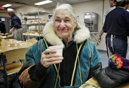 Phyllis Ark, 78, drinks some of her juice during the New Years Day turkey dinner at the Union Gospel Mission's New Years Day service.  130101 January 01, 2013 Mike Deal / Winnipeg Free Press