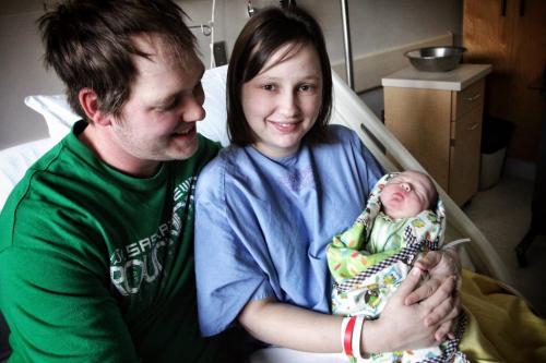 Happy parents Matthew, 30, and Desiree Girardin, 27, with New Years baby, Hudson, born at 12:40 AM weighing 7 Lbs 15 oz at the St. Boniface General Hospital.  130101 January 01, 2013 Mike Deal / Winnipeg Free Press