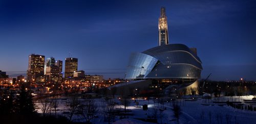 A new beacon, the Candain Museum for Human Rights lit the central tower for the first time Thursday evening seen here with the city skyline glowing at dusk. STAND UP. January 3, 2013 - (Phil Hossack / Winnipeg Free Press) CMHR