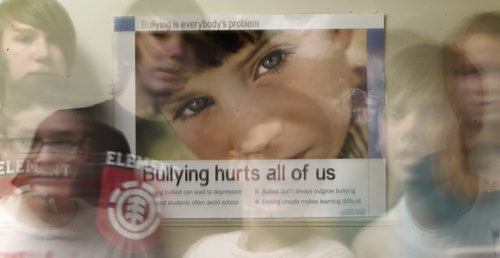 WIndsor School class of 2017 students. Winsor School Students move past a anti-bullying sign posted in their hallway near their classes. See Doug Speirs story on bullying. Dec 22, 2012, Ruth Bonneville  (Ruth Bonneville /  Winnipeg Free Press)
