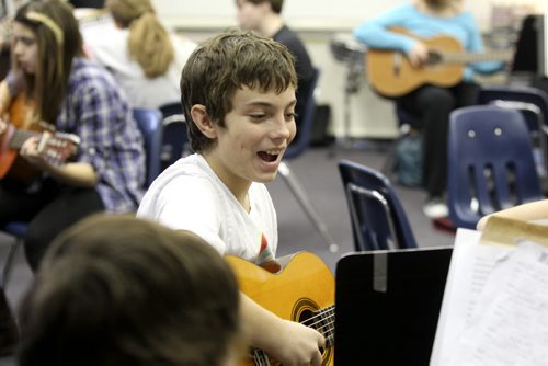 WIndsor School class of 2017 students. Quinn works on his chords in guitar class.  See Doug Speirs story on bullying. Dec 22, 2012, Ruth Bonneville  (Ruth Bonneville /  Winnipeg Free Press)