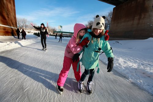 Winnipeger''s enjoyed  skating a sliding under sunny skies at The Forks  Saturday afternoon.  Longtime friends  Katy Frain (pink) and Haley Marino both ten enjoy an afternoon of skating on the Assiniboine River. Standup photo. Jan 03, 2013, Ruth Bonneville  (Ruth Bonneville /  Winnipeg Free Press)