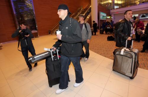 Toronto Blue Jays', Brett Cecil, followed by Aaron Loup, at James Armstrong Richardson Airport, January 5, 2013. (TREVOR HAGAN/WINNIPEG FREE PRESS)
