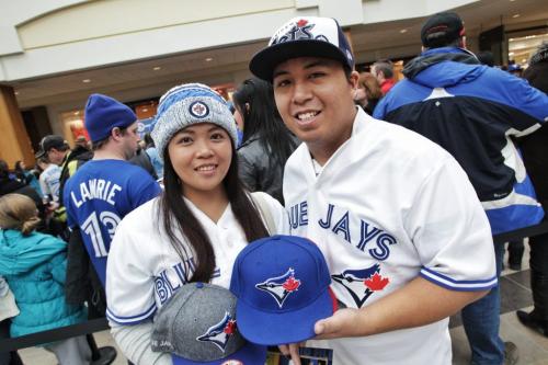Cielo Collantes and Aiejaie Saria wait in line to get autographs from Toronto Blue Jays who are in town while on a cross country fan appreciation tour. Organizers of the event are unofficially saying around 2500 fans showed up to get a chance to meet Jays' Brett Cecil, Aaron Loup and Jose Bautista at Polo Park Shopping Centre.  130106 January 6, 2013 Mike Deal / Winnipeg Free Press