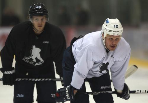 Winnipeg Jet Olli Jokinen, right  with teammate Tobias Enstrom at MTS Iceplex in Winnipeg Monday - a welcome sight to fans after the NHL 117 day lockout  See Ed Tait story- January 07, 2013   (JOE BRYKSA / WINNIPEG FREE PRESS)