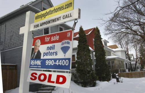 Generic shot of a SOLD  sign in front of a home in Winnipeg. This scene is in the Wolseley neighbourhood. Murray McNeill story    . (WAYNE GLOWACKI/WINNIPEG FREE PRESS) Winnipeg Free Press  Jan. 7 2013