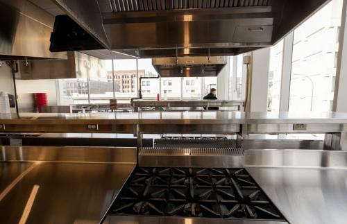 The view from a student's perspective of a stove and food workspace. Students will have their own counter space, and three burners to use on these stoves. Red River' College's new Paterson Global Foods Institute will officially open in February but classes have already started.  (Melissa Tait / WInnipeg Free Press)