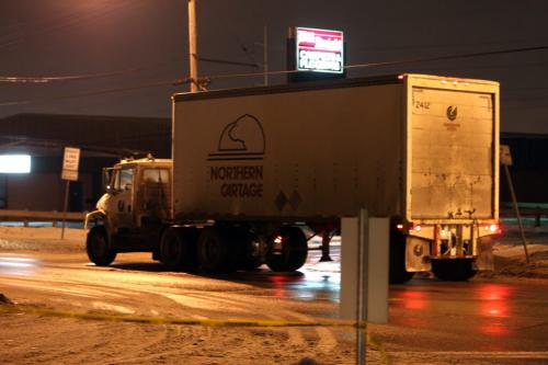 A Northern Cartage truck is all that can be seen on Century where a accident has caused  Police Officer to close that portion of the road from Wellington  Ave.  Jan 10, 2013.  (Ruth Bonneville /  Winnipeg Free Press)