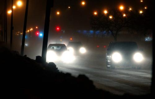 Winter blizzard sets in. Cars on Grant near Route 90 are hampered by blowing snow. January 11, 2013  BORIS MINKEVICH / WINNIPEG FREE PRESS