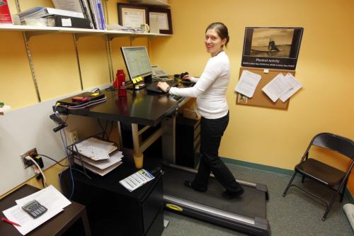At U of M Max Bell Centre in the office of Danielle Bouchard, an assistant kinesiology professor, is a desk tread mill. Local fitness experts talk about their New Year's resolutions. She doesn't have any resolutions because she's already fit and spends most of her days exercising. It's a treadmill/desk hybrid. STORY APPEARING: Monday Life front. January 11, 2013  BORIS MINKEVICH / WINNIPEG FREE PRESS