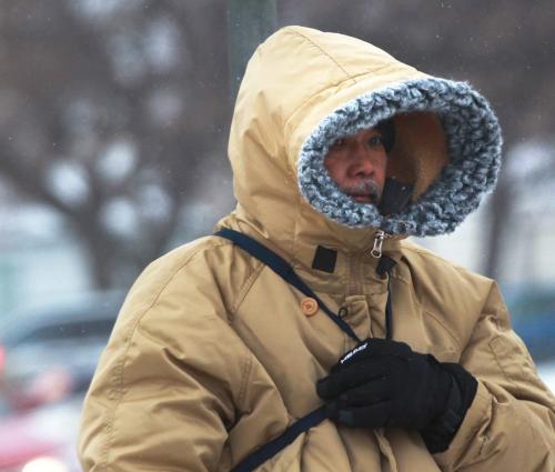 Bring it On-This man is prepared for high winds and snow on Notre Dame Ave and Balmoral St  that is predicted friday afternoon- The weather will get frightful throughout the day and overnight as Environment Canada has forecasted blizzard conditions into Saturday morning-Standup Photo- January 11, 2013   (JOE BRYKSA / WINNIPEG FREE PRESS)