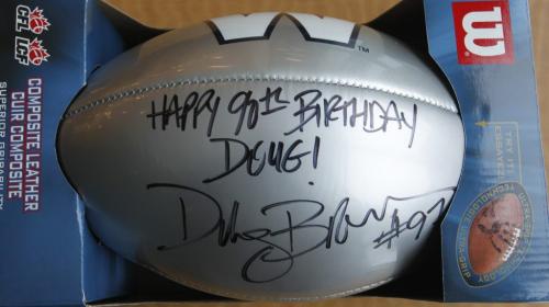 Retired Winnipeg Blue Bomber player Doug Brown autographed a football for Douglas Brown who recently turned 90 and once played for the Bombers. The ball will be presented to the 90 year old at a  birthday celebration Saturday.  Geoff Kirbyson story  (WAYNE GLOWACKI/WINNIPEG FREE PRESS) Winnipeg Free Press  Jan. 11 2013