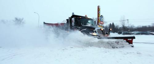 A city snowplow clears snow along Pembina Highway, Saturday, January 12, 2013. (TREVOR HAGAN/WINNIPEG FREE PRESS)
