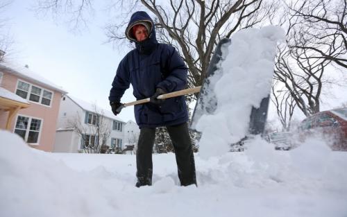 David Rozniatowski clears snow from in front of his home near the corner of McMillan Ave. and Cambridge St., Saturday, January 12, 2013. (TREVOR HAGAN/WINNIPEG FREE PRESS)