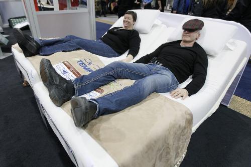 January 13, 2013 - 130113  -  Allan Zimmer and Michele Taylor try out their new bed which they purchased at the Kitchen and Bath Show at the Convention Centre Sunday January 13, 2013.  John Woods / Winnipeg Free Press