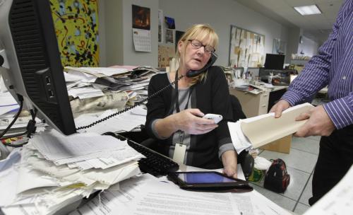 Books. ILLUSTRATION . Multi-tasking.  (WAYNE GLOWACKI/WINNIPEG FREE PRESS) Winnipeg Free Press  Jan. 15 2013