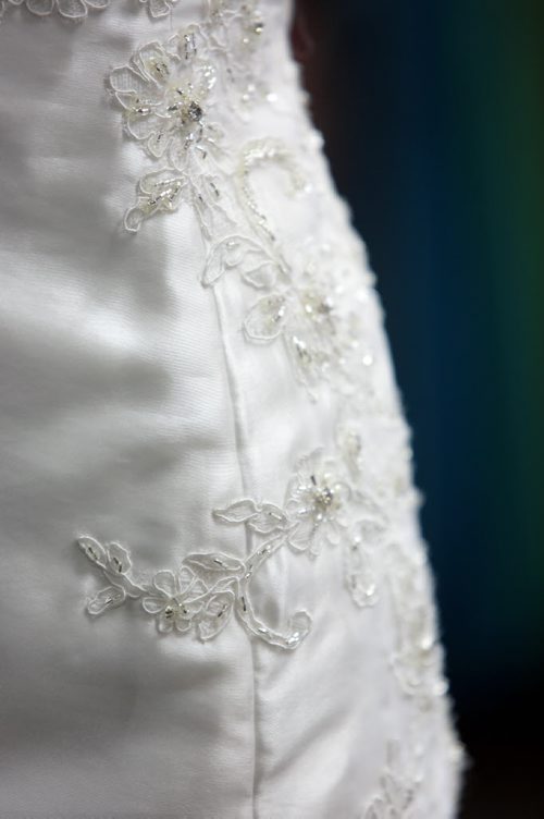 Brandon Sun 15012013 Applique detail on a Impressions Bridal wedding dress at Muse Bridal Studio on 18th St.  (Tim Smith/Brandon Sun)