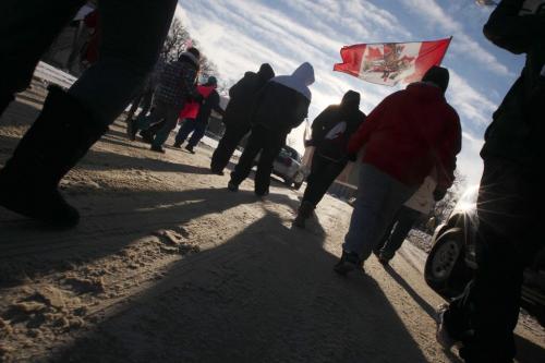 Aprx 25-30 Idle No More protestors headed up Memorial Blvd towards the Manitoba Legislature Wednesday morning near 11 AM-See web brief- January 16, 2013   (JOE BRYKSA / WINNIPEG FREE PRESS)