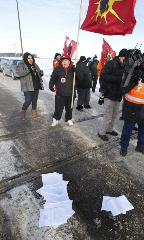 Court injunction papers left for the protesters were kicked onto the CN railway crossing on the Yellowhead Highway west of Portage la Prairie Wednesday afternoon.  (WAYNE GLOWACKI/WINNIPEG FREE PRESS) Winnipeg Free Press  Jan. 16 2013