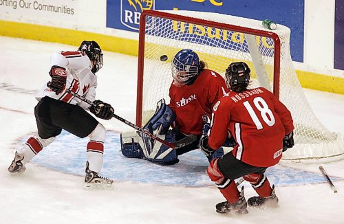 BORIS MINKEVICH / WINNIPEG FREE PRESS  070403 Canada vs. Switzerland IIHF World Women's hockey Championship. Canada #16 Jayna Hefford scores goal #5 in the first period.