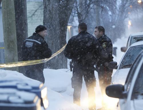 Winnipeg Police at a taped off area in the 500 block on Burrows  Ave. Friday, it was reported a person was injured earlier.   (WAYNE GLOWACKI/WINNIPEG FREE PRESS) Winnipeg Free Press  Jan. 18 2013