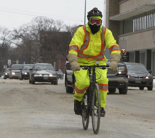Cyclist in downtown Winnipeg Friday. For Bruce Owen car-cyclist collision story. (WAYNE GLOWACKI/WINNIPEG FREE PRESS) Winnipeg Free Press  Jan. 18 2013