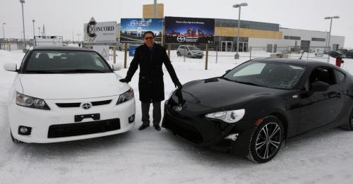 New Scion car dealership is under construction in the Waverley West Auto Mall , Ashok Dilawri    president of Dilawri Group with new Scion cars and dealership under construction rear . Martin Cash story -  KEN GIGLIOTTI / JAN. 18 2013 / WINNIPEG FREE PRESS