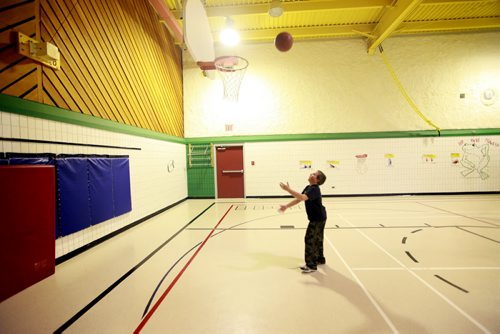 Reynolds School in the RM of Reynolds  a hour and a half east of Winnipeg has only 9 kids attending ithe school due to low enrollment. Students enjoy a full size gymnasium for only 7 students.  Devon Nazer -  9 yrs tries to get his ball in the basket during gym class.  See Nick Martin's story. Jan 16 2013, Ruth Bonneville  (Ruth Bonneville /  Winnipeg Free Press)