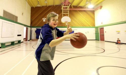 Reynolds School in the RM of Reynolds  a hour and a half east of Winnipeg has only 9 kids attending ithe school due to low enrollment. Students enjoy a full size gymnasium for only 7 students.  Hawk Reimer - 10 yrs,  plays ball with her classmates.  See Nick Martin's story. Jan 16 2013, Ruth Bonneville  (Ruth Bonneville /  Winnipeg Free Press)