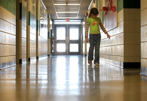 Reynolds School in the RM of Reynolds  a hour and a half east of Winnipeg has only 9 kids attending ithe school due to low enrollment. Latisha Smith 7 years walks down the long hallway alone.   See Nick Martin's story. Jan 16 2013, Ruth Bonneville  (Ruth Bonneville /  Winnipeg Free Press)