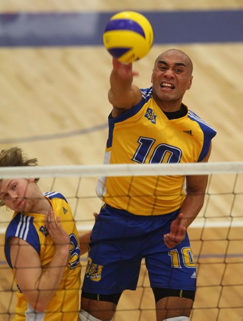 Brandon Sun Bobcats' Sam Tuivai plays the ball during Saturday night's university volleyball match against the visiting University of Alberta Golden Bears at the BU Healthy Living Centre. (Bruce Bumstead/Brandon Sun)