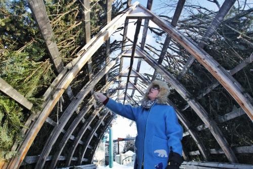 Arna Sisson checks out the progress of the re-thatching effort of the warming hut her architect husband, Richard Kroeker, designed and built for the river trail at The Forks.  130120 January 20, 2013 Mike Deal / Winnipeg Free Press