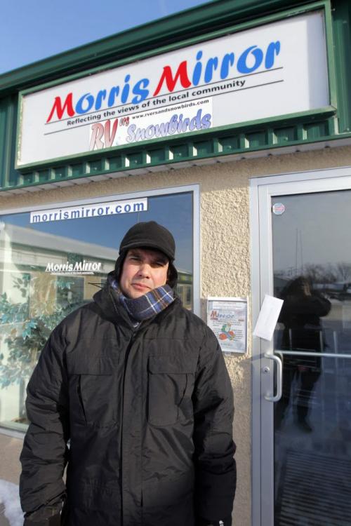 MORRIS, MB - Niigaanwewidam James Sinclair poses in Morris at the Morris Mirror newspaper. There he delivered a letter to the editor (he taped it to the front door) The Mirror ripped native people calling them "lazy" and "terrorists" in the paper. January 22, 2013  BORIS MINKEVICH / WINNIPEG FREE PRESS