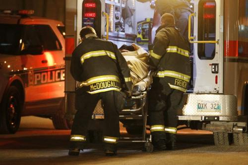 January 22, 2013 - 130122  -  Emergency personnel remove a stabbing victim from 400 Kennedy Tuesday January 22, 2013.  John Woods / Winnipeg Free Press